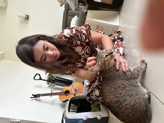 alyaa with her temporary cat, kewpie